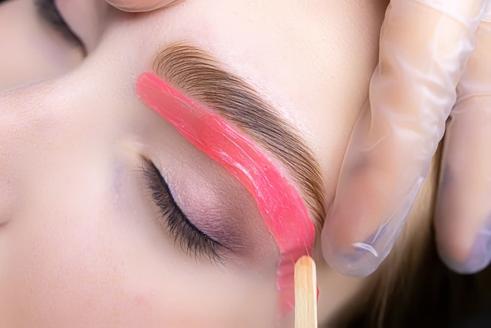 Client receiving eyebrow wax alongside lash tint at The Beauty Spot in Wadebridge