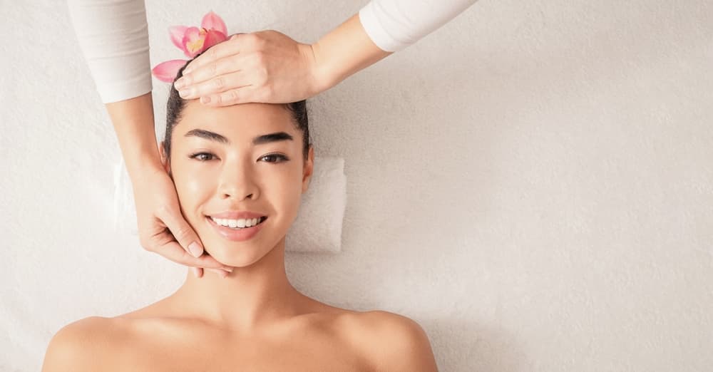 Woman receiving a relaxing facial massage at The Beauty Spot in Wadebridge, Cornwall