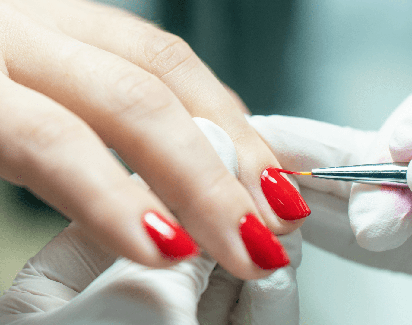 Classic manicure with vibrant red polish at The Beauty Spot in Wadebridge